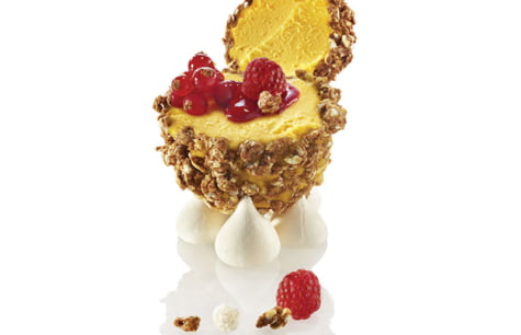 GRANOLA MYSTERY FILLED WITH MANGO SORBET, RED FRUITS HEART, RASPBERRY COULIS AND MERINGUE...