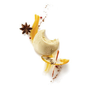 RICE PUDDING ICE CREAM ON EXOTIC COULIS AND SPICES (CINNAMON, CARAWAY, TURMERIC, ROSE PEPPER, STAR ANISE, SWEET PAPRIKA)