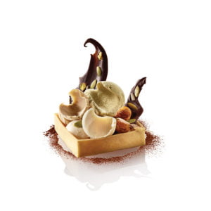 PISTACHIO, ALMOND AND HAZELNUT SORBET TRIO, IN A SHORT CUT PASTRY SHELL, MENDIANT AND CANDIED DRIED FRUITS